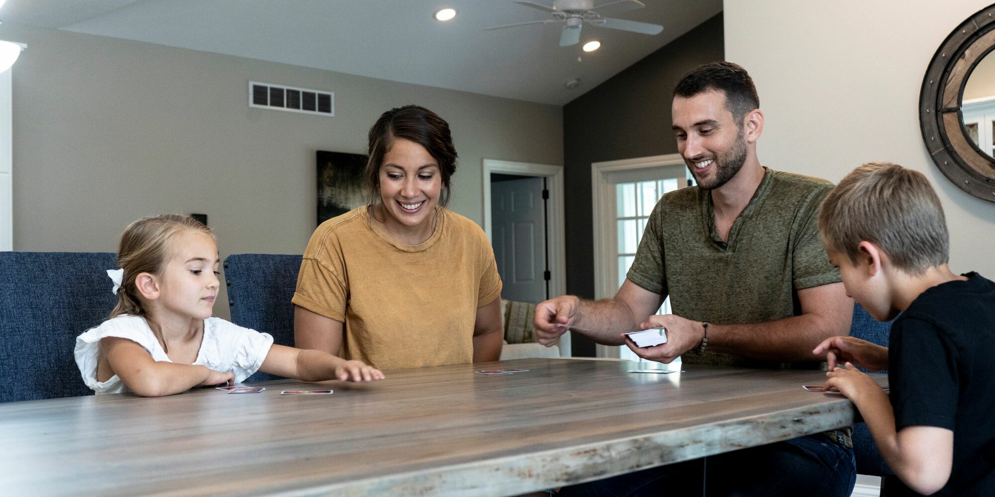 family around Amish made table