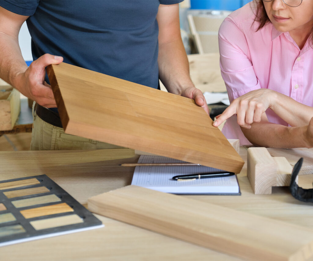 Reviewing custom furniture wood sample and spec sheet